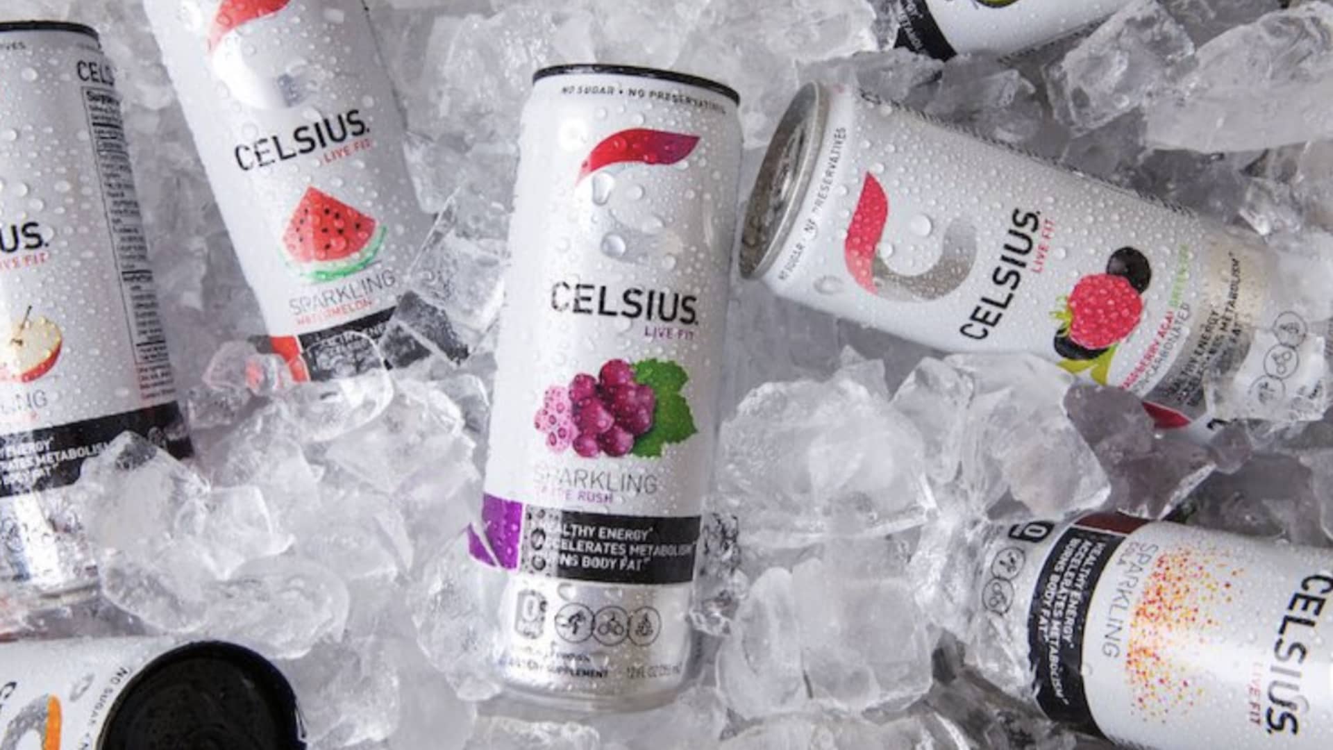An invigorating can of Celsius Energy Drink, showcasing a citrus-flavored carbonated beverage on a white table.